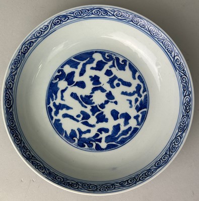 Lot 67 - A CHINESE BLUE AND WHITE PLATE, 

Six...