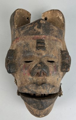 Lot 194 - A WOODEN TRIBAL MASK, 

25cm x 18cm