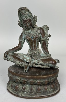 Lot 617 - A BRONZE GEM SET TARA ON A LOTUS BASE