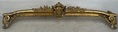 Lot 209 - A 19TH CENTURY ROCOCCO CARVED GILT WOOD PELMET,...