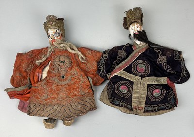 Lot 621 - A PAIR OF EARLY 20TH CENTURY CHINESE BISQUE PUPPETS WITH SILK COSTUMES (2)