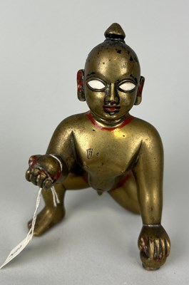 Lot 236 - A SOUTH EAST ASIAN BRONZE CROUCHING FIGURE,...