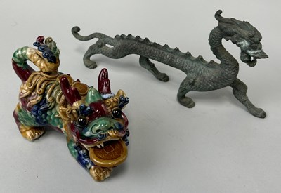 Lot 257 - A CHINESE BRONZE DRAGON ALONG WITH A CERAMIC...