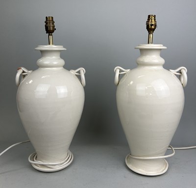 Lot 999 - A PAIR OF WHITE GLAZED TABLE LAMPS IN THE CHINESE MANNER