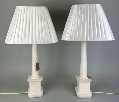 Lot 439 - A PAIR OF WHITE MARBLE LAMPS WITH SHADES...