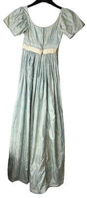 Lot 546 - A BLUE DRESS BY REPUTE TO HAVE BELONGED TO...