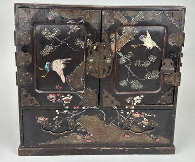 Lot 549 - A JAPANESE BLACK PAINTED TABLE CABINET, 

37cm...