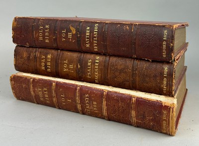 Lot 605 - THREE LARGE LEATHER BOUND ANTIQUE BIBLES (3)