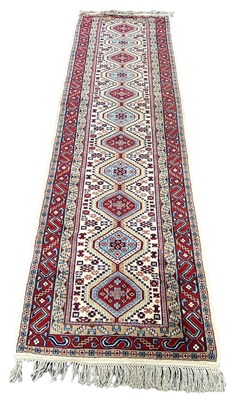 Lot 612 - A PERSIAN RUNNER, 

300cm x 80cm