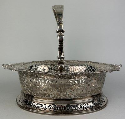 Lot 1 - A GEORGE II SILVER CAKE BASKET, Marked for...