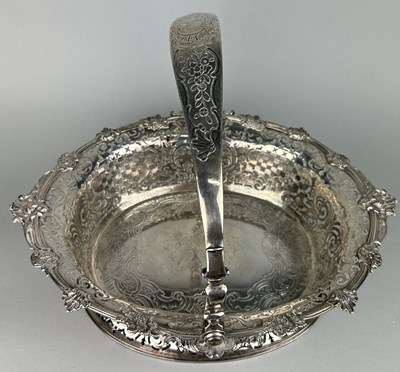 Lot 1 - A GEORGE II SILVER CAKE BASKET, Marked for...