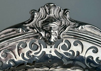 Lot 1 - A GEORGE II SILVER CAKE BASKET, Marked for...