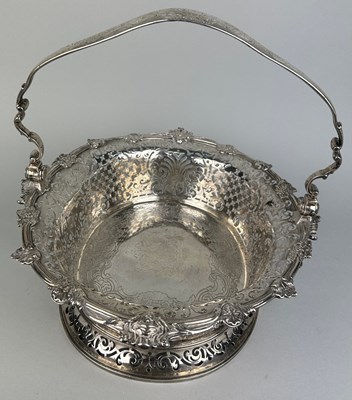 Lot 1 - A GEORGE II SILVER CAKE BASKET, Marked for...