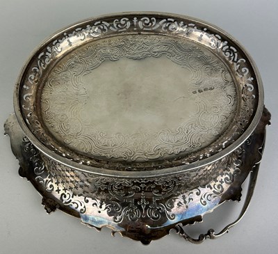 Lot 1 - A GEORGE II SILVER CAKE BASKET, Marked for...