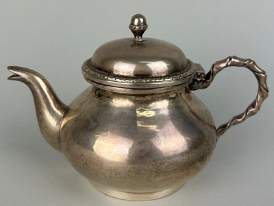 Lot 14 - AN ITALIN 800 SILVER TEA POT,

Weight: 268gms