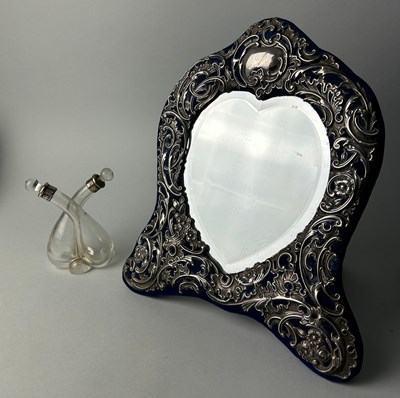 Lot 19 - A SILVER FRAMED MIRROR AND AN UNUSUAL GLASS...