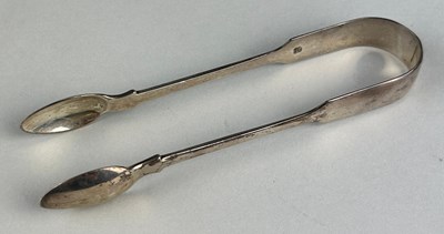 Lot 47 - A PAIR OF VICTORIAN SILVER TONGS, 

Weight: 44gms