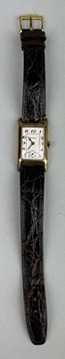 Lot 68 - A GENEVE WRISTWATCH MARKED 585, 

With brown...