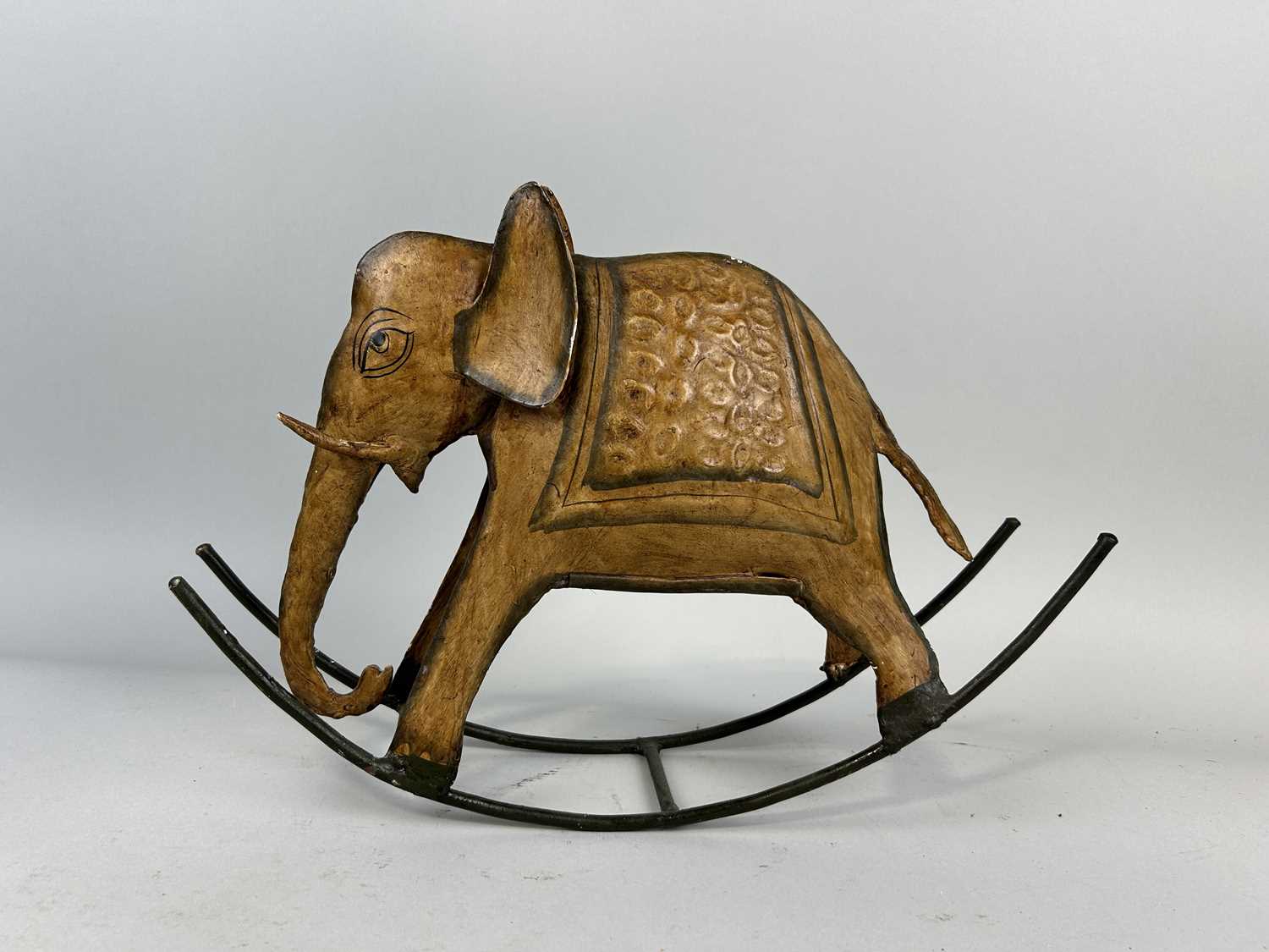 Lot 648 - A MINIATURE INDIAN PAINTED ELEPHANT ROCKING