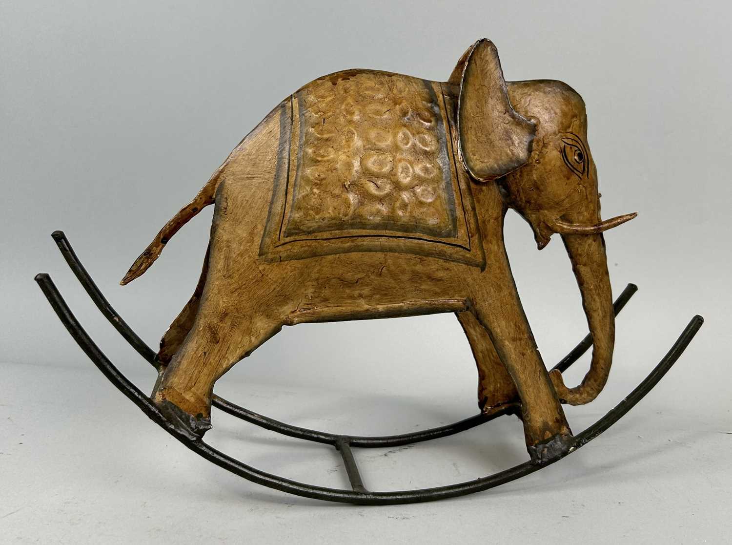 Lot 648 - A MINIATURE INDIAN PAINTED ELEPHANT ROCKING