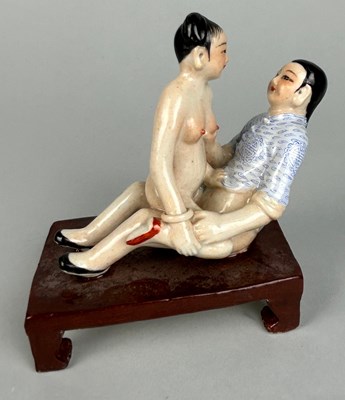 Lot 113 - A CHINESE EROTIC CERAMIC GROUP DEPICTING MALE...