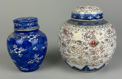 Lot 143 - TWO CHINESE TEA JARS,
 
Largest 11cm H x 12cm W